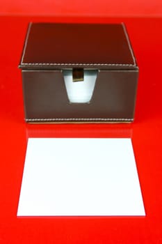 A note block isolated against a red background