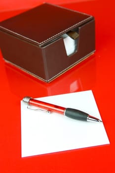 A note block isolated against a red background