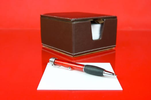 A note block isolated against a red background