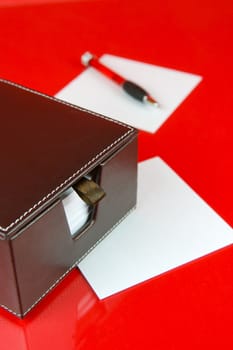 A note block isolated against a red background