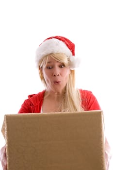 Woman with long blond hair getting a present and looking surprised