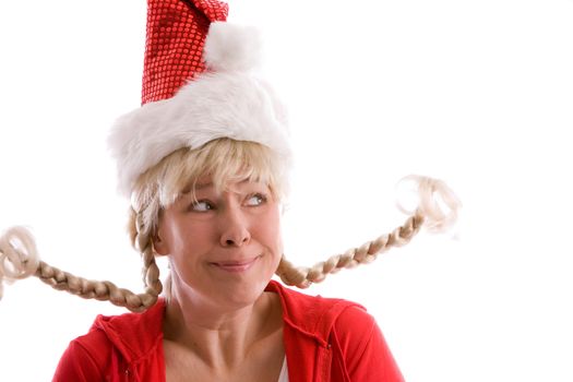 Mature woman with christmas hat and two funny pigtails