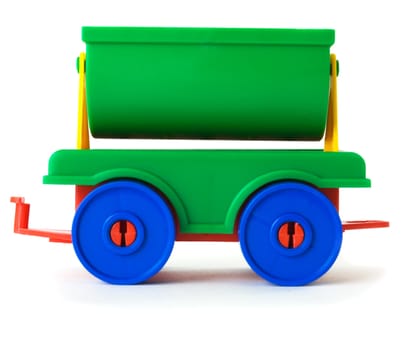 Toy green plastic carriage on the white background