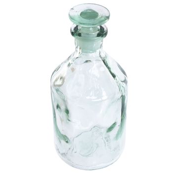 Small bottle from glass on the white background