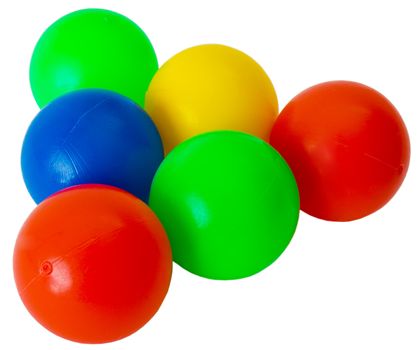 Small plastic colored balls on the white background