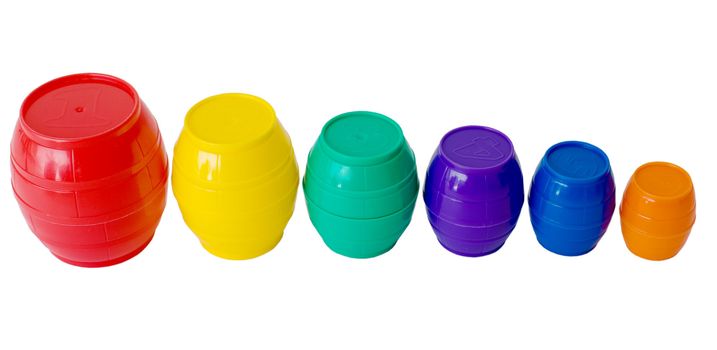Small six plastic barrels on the white background