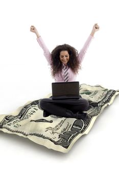 successful businesswoman with laptop sitting on three dimensional note
