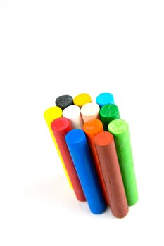 Oil pastels/crayons isolated against a white background