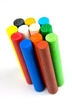 Oil pastels/crayons isolated against a white background