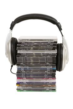 front view of headphones and cd, dvd isolated on white