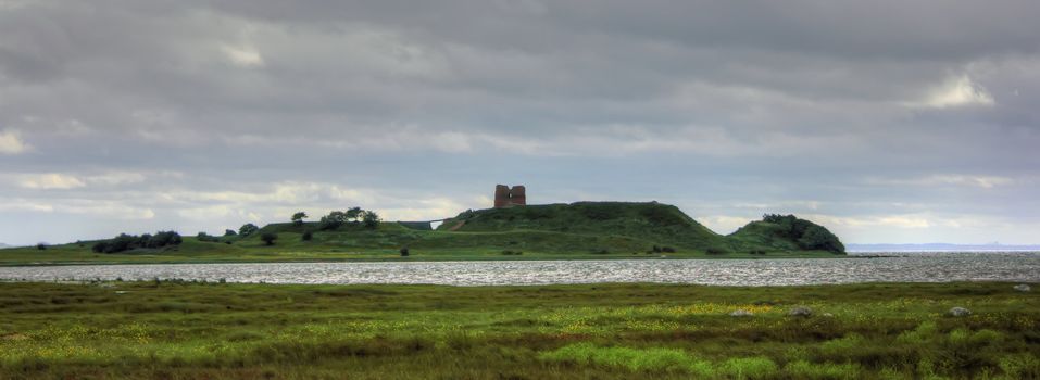 Middle age ruin of castle situated on an isolated island