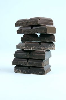 Dark Chocolate isolated against a blue background