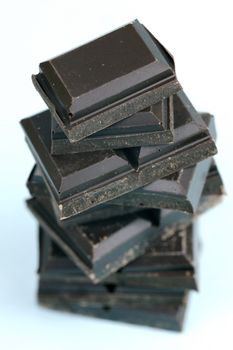 Dark Chocolate isolated against a blue background