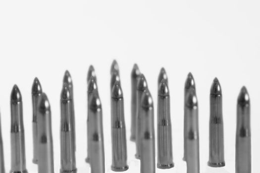 ammunition all in a cluster on a white background