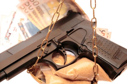 drugs money and gun depicting a drug culture scene