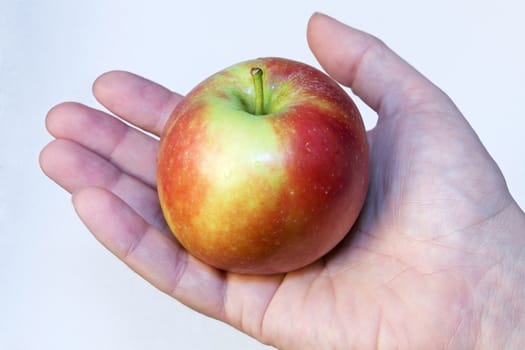 apple in open hand 