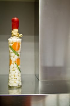 Decorative bottle on the stainless surface