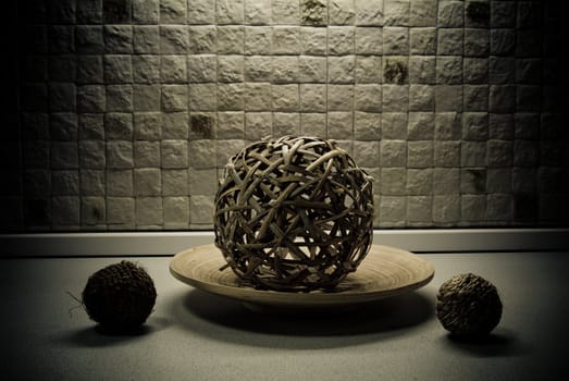 Some straw spheres in kitchen still-life