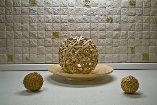 Some straw spheres in kitchen still-life