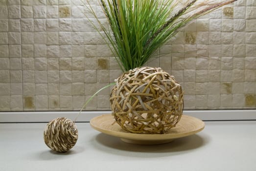 Some straw spheres in kitchen still-life