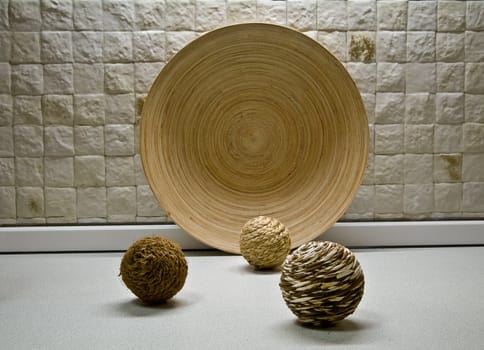 Some straw spheres in kitchen still-life