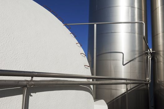 Stainless steel and concrete tanks in a winery, Alentejo, Portugal