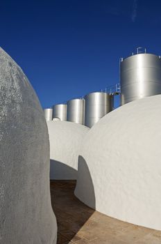 Stainless steel and concrete tanks in a winery, Alentejo, Portugal