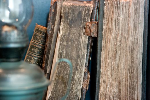 Old books and kerosene lamp