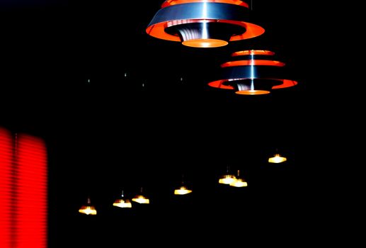 Lamps hanging like UFO in the interior