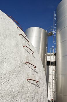 Stainless steel and concrete tanks in a winery, Alentejo, Portugal