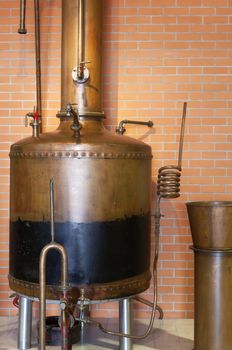 Traditional copper still detail in a winery, Alentejo, Portugal