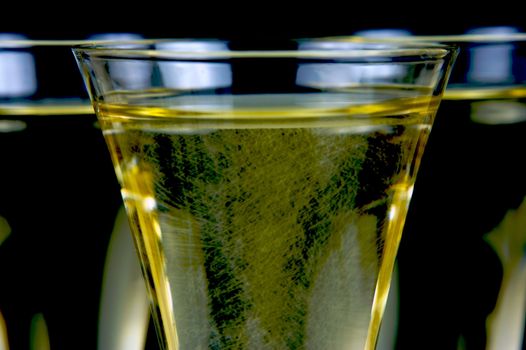 Sparkling wine isolated against a black background