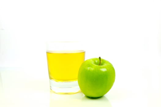 Apple juice isolated against a white background