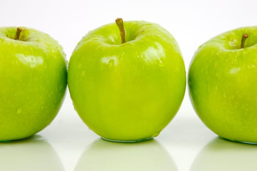 Green apples isolated against a white background