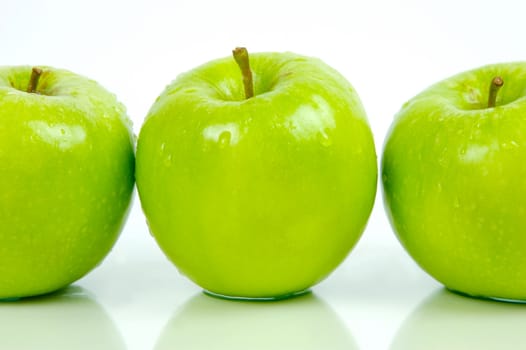 Green apples isolated against a white background