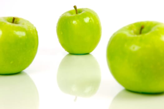 Green apples isolated against a white background