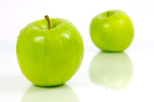 Green apples isolated against a white background