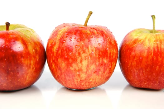 Red apples isolated against a white background