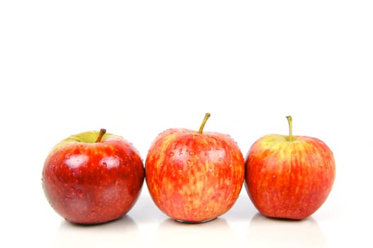 Red apples isolated against a white background