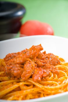 italian spaghetti pasta with fresh homemade tomato and chicken sauce