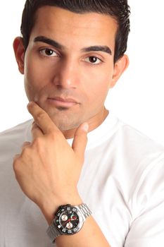 Thinking man wearing a chronograph wrist watch or man advertising a watch.  White background.