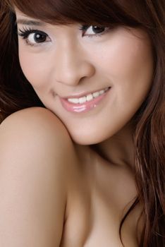 Closeup portrait of beauty of Asian with smiling expression.