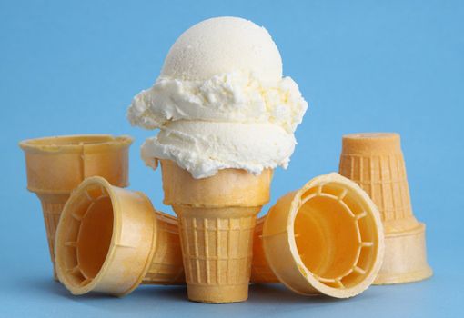 vanilla ice cream cone, blue background