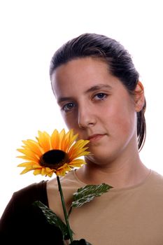 casual woman smelling a sunflower