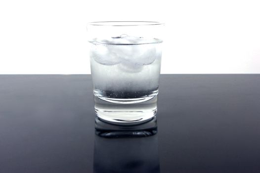 A glass of ice cold water