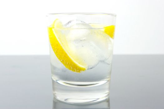 Ice water with a wedge of lemon