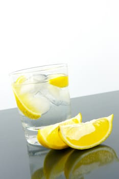 Ice water with a wedge of lemon