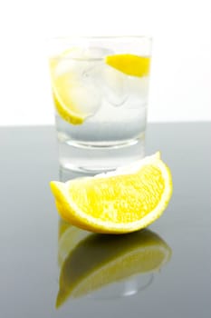 Ice water with a wedge of lemon