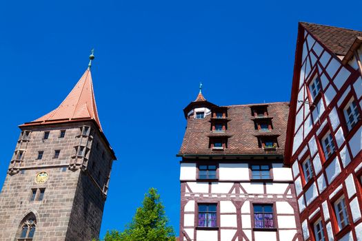 Half-timbered houses and tower of the Nuremberg castle (Nürnberg, Germany)