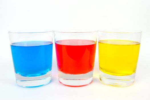 Glasses of soft drink isolated against a white background